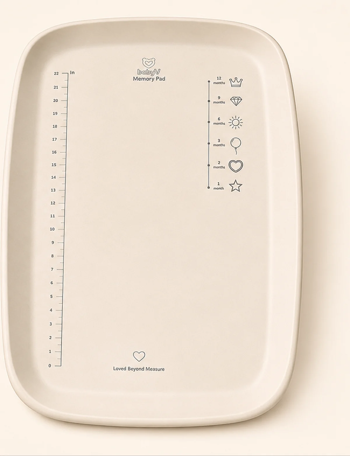 Top view of the MemoryPad™ showing the built-in growth ruler, first-year age markers and contoured pad shape